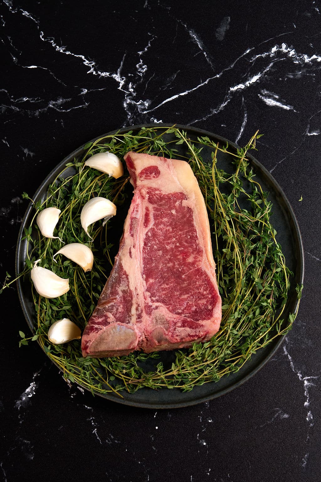 T-BONE ANGUS PRIME T-BONE STEAK (1 -1.25 LBS) - Image 1